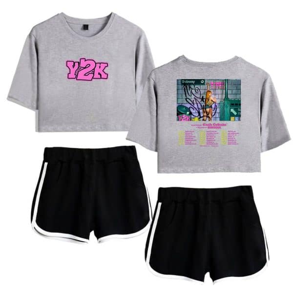 Y2K graphic crop top sweatshirt, streetwear style with a bold pink Y2K logo, paired with black athletic shorts with white trim. Perfect casual outfit for retro fashion enthusiasts.