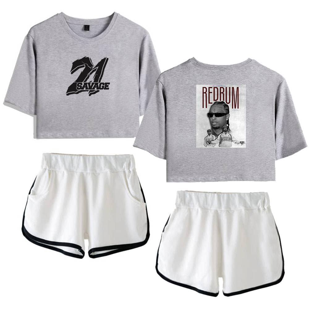 2. Gray cropped T-shirts with bold graphic prints and athletic white shorts with black trim, perfect for casual outings or active wear.