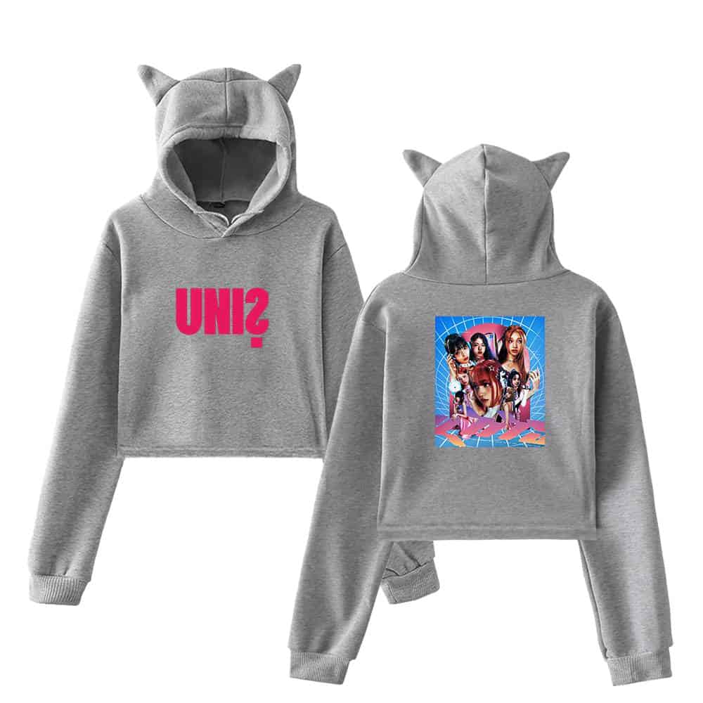 UNiZ logo hoodie featuring a front pink logo and a colorful anime-inspired graphic on the back, including stylized characters and vibrant background. Made from soft grey fabric with cute cat-ear hood detail.