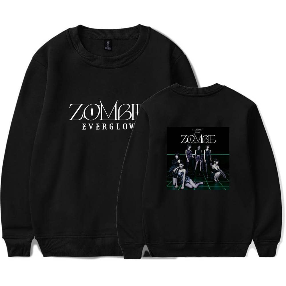 ZOMBIE EVERGLOW sweatshirt with graphic print and branding, black casual unisex hoodie, trendy streetwear style, ideal for fans of the K-pop group, comfortable and fashionable merchandise.