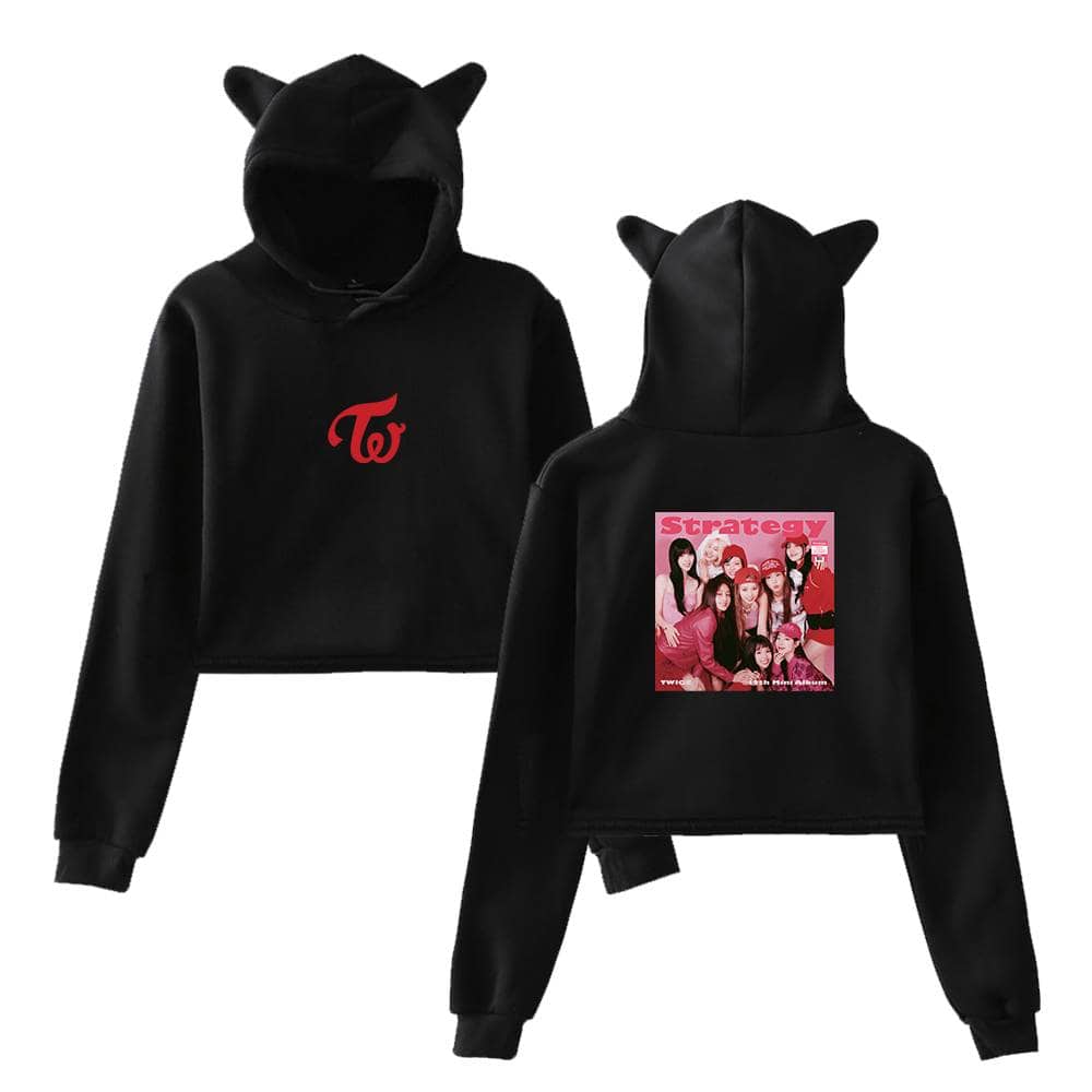 Twice merchandise hoodie with a cute cat ear hood, featuring the TWICE logo on the front and a vibrant group photo design on the back, perfect for K-pop fans.