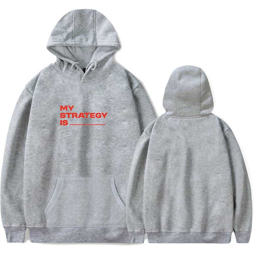 MY STRATEGY IS ________ printed in bold red text on a light gray hoodie with a front pocket and adjustable drawstrings. The hoodie has a casual, comfortable style perfect for everyday wear.