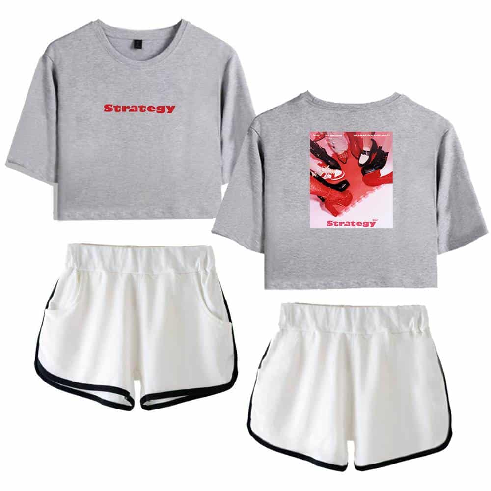 Strategy cropped sweatshirt with graphic back and front design, paired with white athletic shorts with black trim, suitable for casual and sporty streetwear looks.