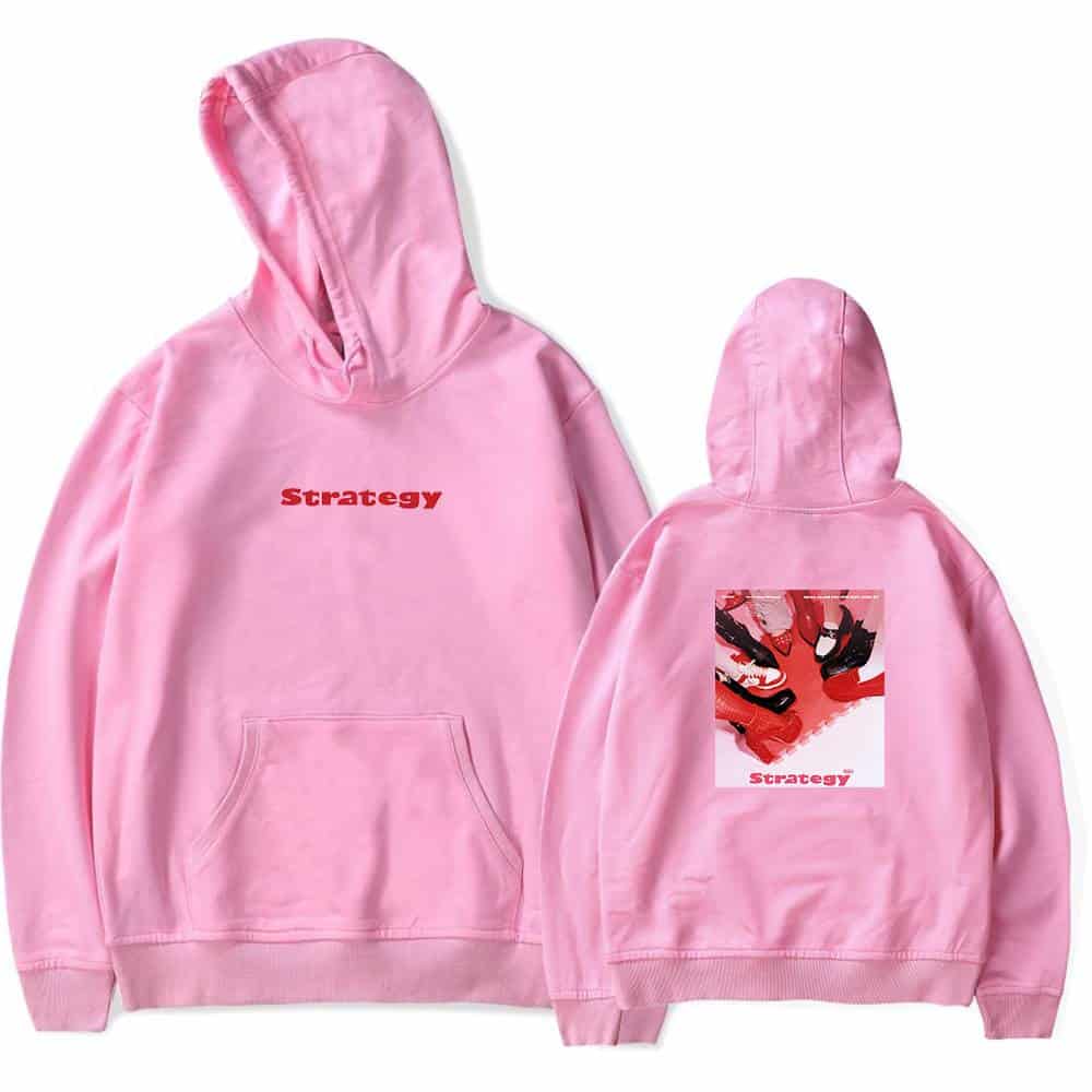 Pink hoodie with "Strategy" text on front and graphic print on back, casual streetwear, oversized fit, warm and comfortable for everyday wear, trendy and fashionable merchandise.