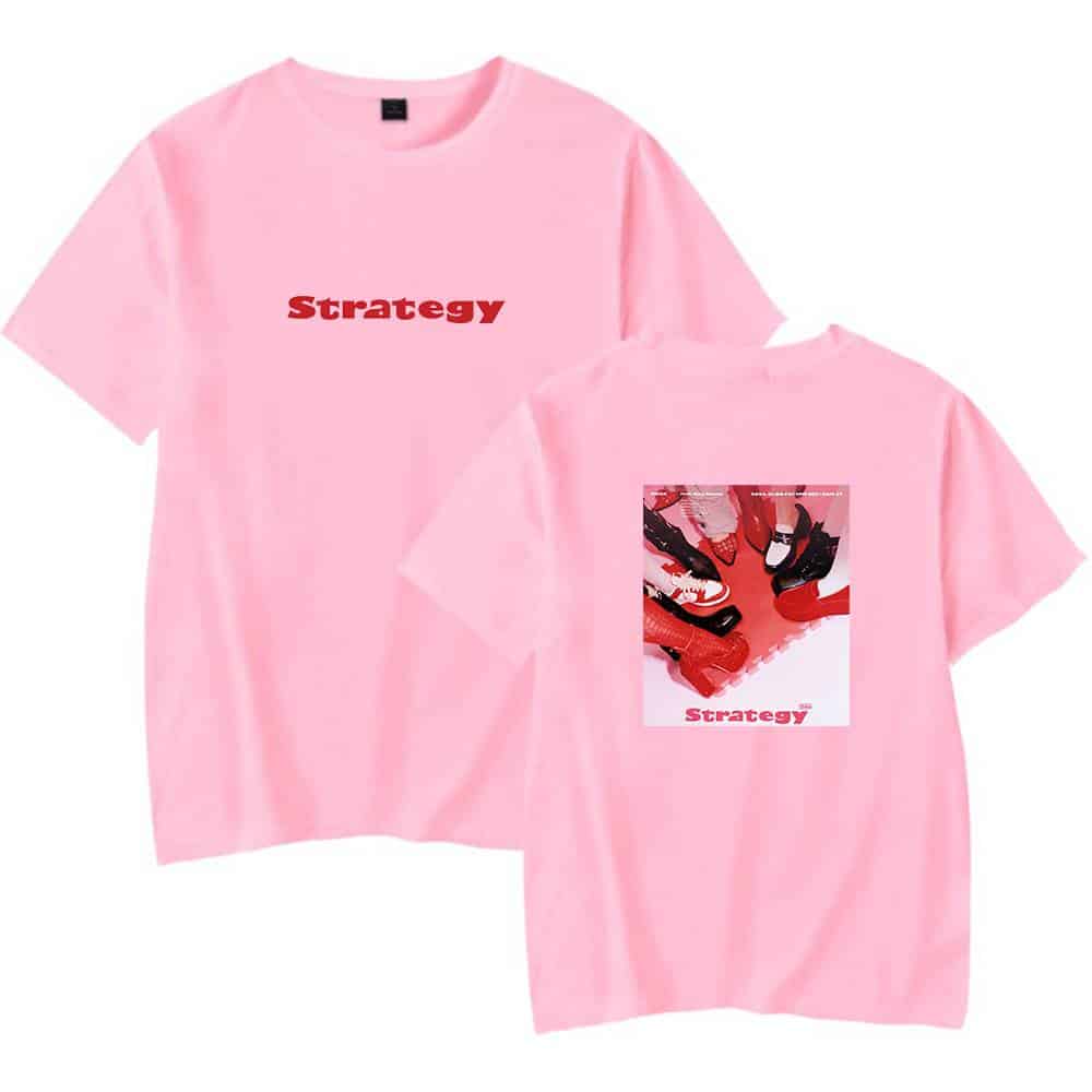 Strategy t-shirt with bold red text and graphic design featuring various sneakers on a pink background.