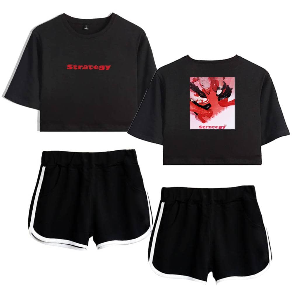 Black cropped sweatshirt with red "Strategy" text front and colorful shoe graphic back, paired with black shorts with white trim, trendy athletic style merchandise.