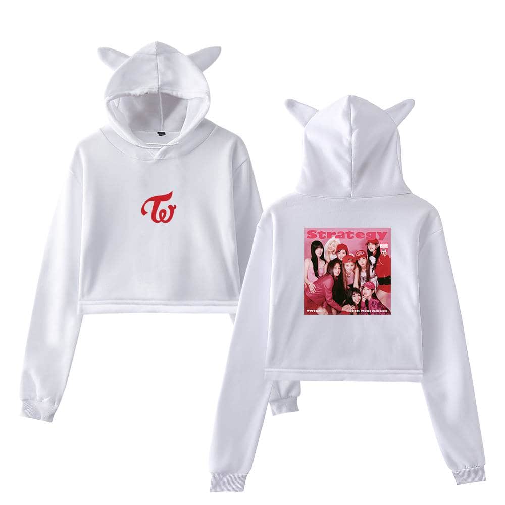 TWICE logo hoodie with cat ears, featuring a group photo on the back in pink tones, perfect for fans of the K-pop girl group TWICE. Comfortable, stylish merchandise for concert or casual wear.